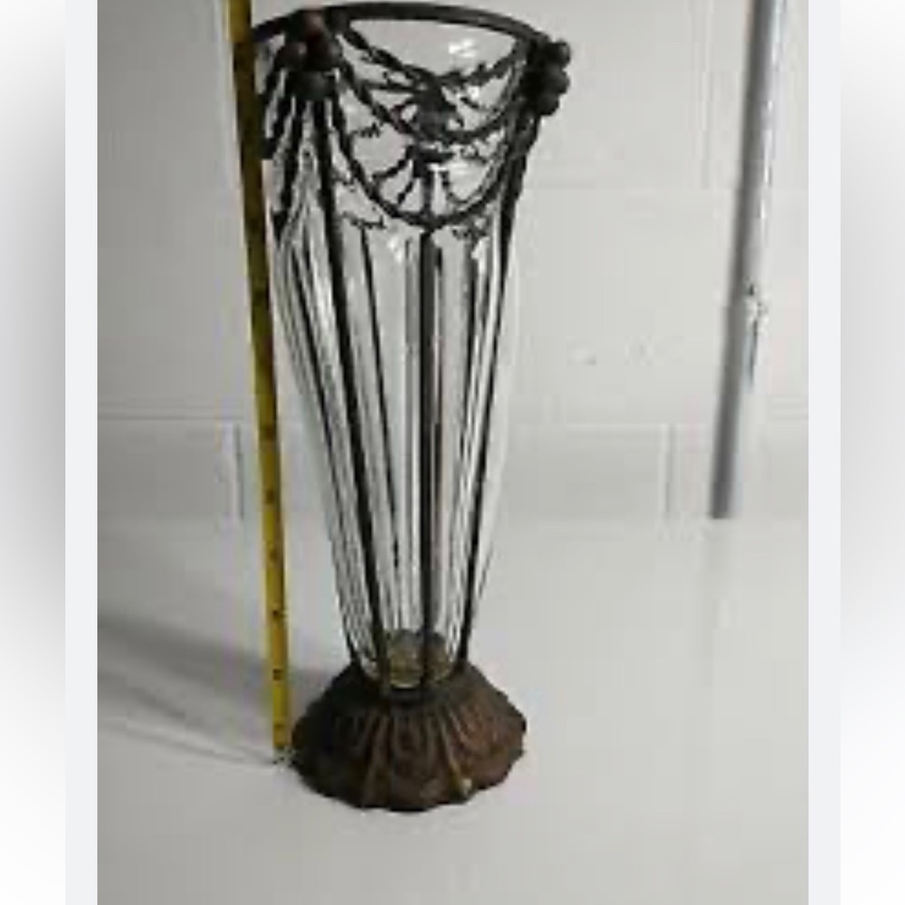 Vintage vase. Hand blown glass. Wrought iron frame No chips or cracks. Beautiful